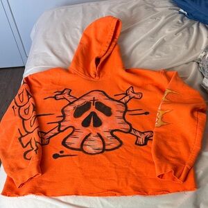 Vibrant Orange Skull Graphic Hoodie